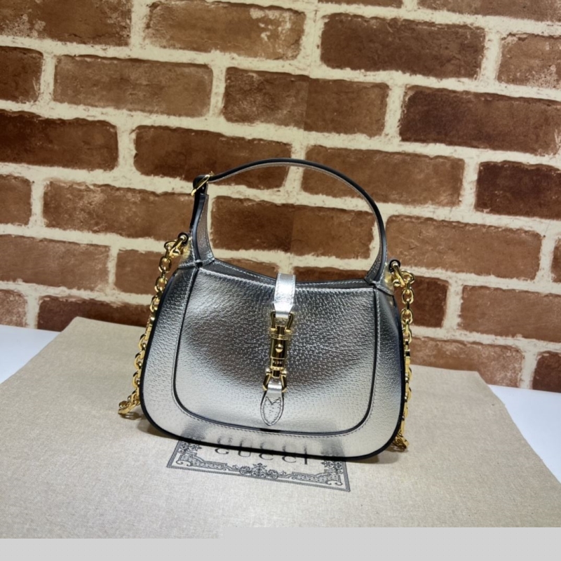 G*u*i top handle bags